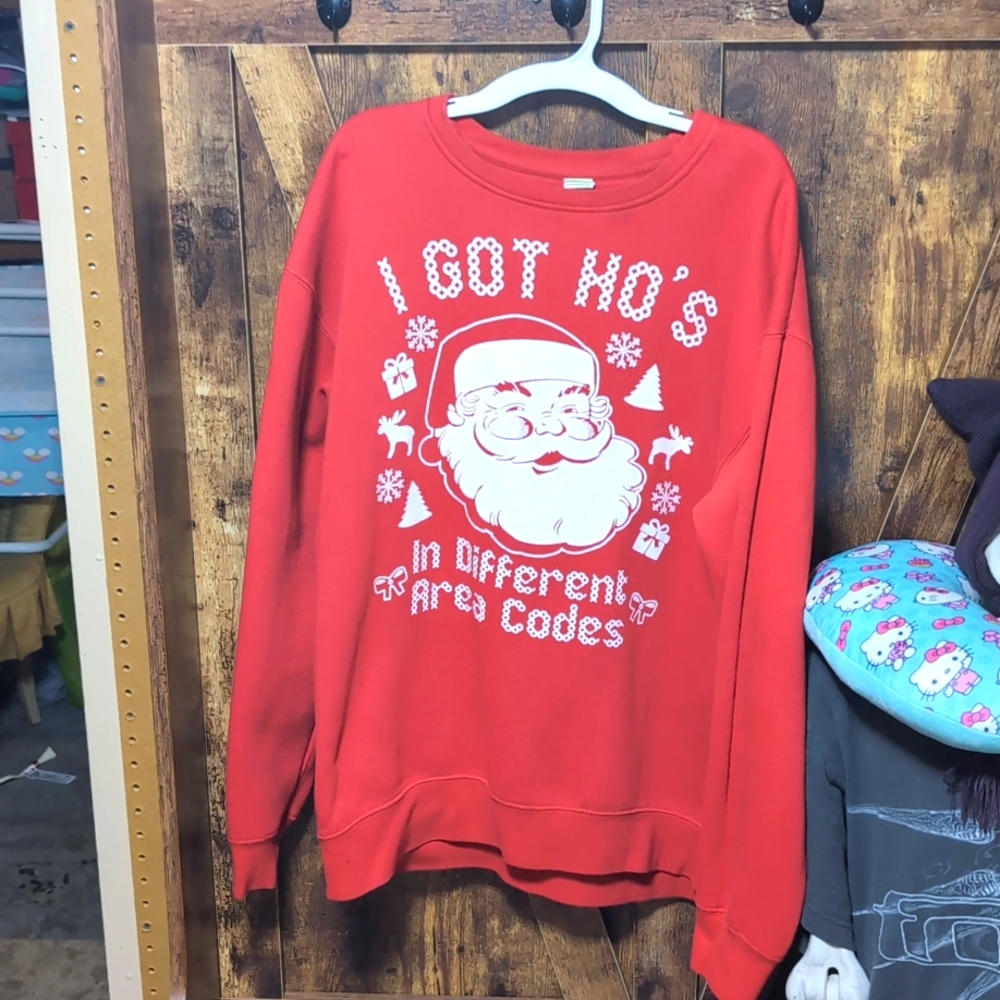 Christmas sweatshirt. Ho's in different area codes.